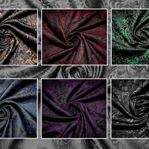 May include: Six fabric swatches with a black background and a swirling pattern in different colors: gold, red, green, blue, purple, and silver.