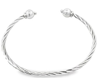 Made on Cape Cod. Bracelet cuff style with twisted silver. Solid .925 Silver. Free shipping in box.  Michaels- Provincetown, Chatham