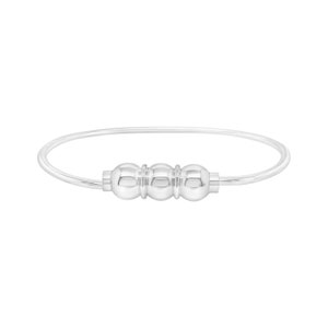 May include: A silver bangle bracelet with three round beads in the center.