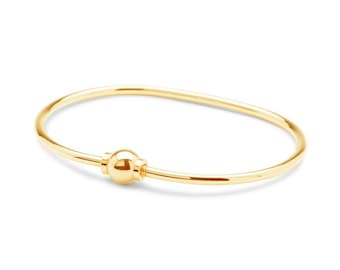 The Beach Ball Bracelet Solid 14k yellow gold screwball bracelet . Made on Cape Cod Ships from Cape Cod