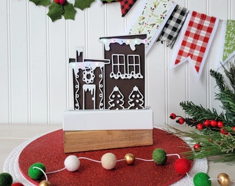 Light-up gingerbread house word stack. Base sold separately.