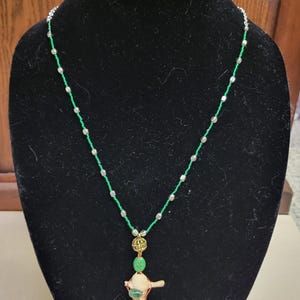 Beaded Necklace with Bone Cross Pendant