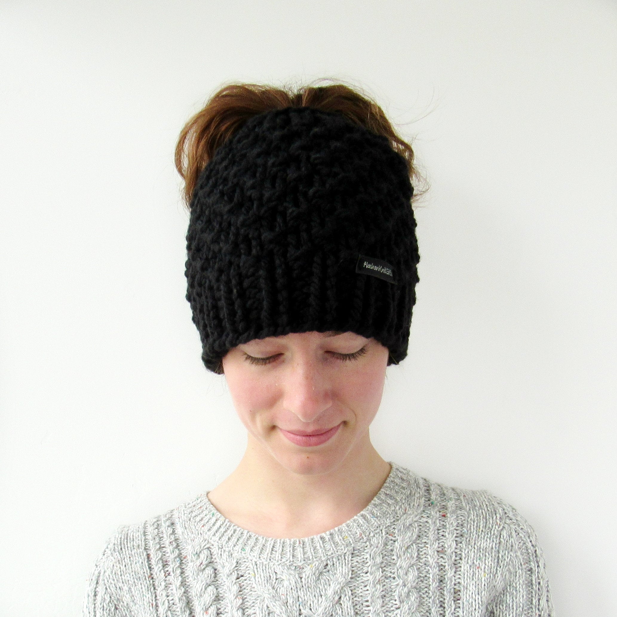 knitted hat with hole on top