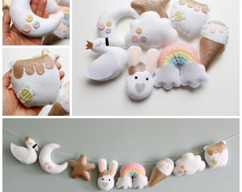 Make Your Own felt Pastel Dreams Garland Kit, sewing kit with full materials and patterns to ake 8 decorations.