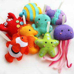 Under the Sea themed felt decorations. Choice of 8 designs. Felt clownfish, crab, octopus, jellyfish, starfish, seahorse