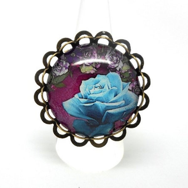 Bague bronze cabochon verre rose bleue