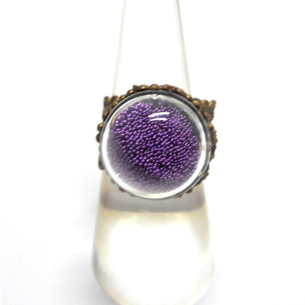 Bague filigrane bronze globe sable violet