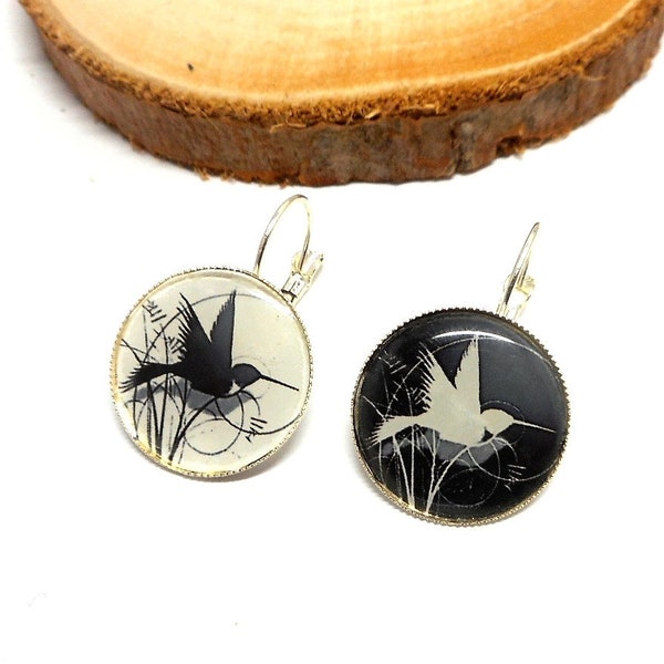 Black and white birds mismatched sleeper earrings by breloques et cie