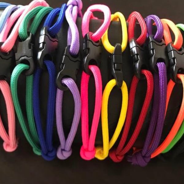 Paracord Whelping Collars (12) Newborn breakaway and 12 Regular breakaway paracord in solid colors with black breakaway clips.