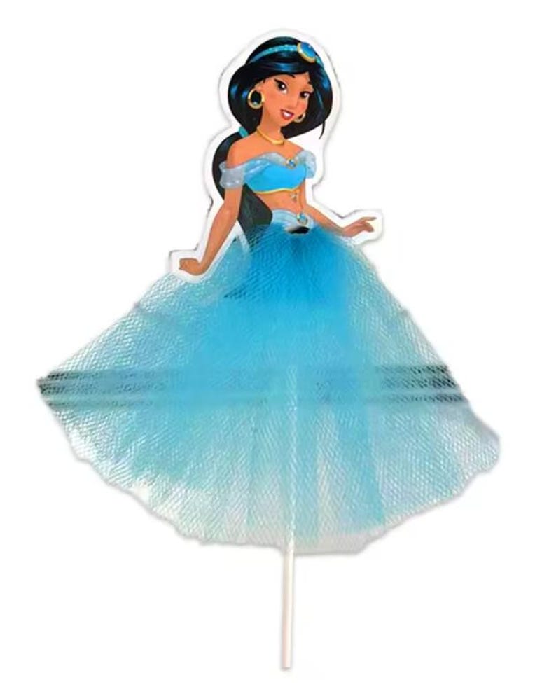 May include: A princess-themed cake topper featuring a cartoon illustration of a woman in a blue outfit with a tulle skirt. The figure has dark hair, gold jewelry, and is mounted on a white stick.