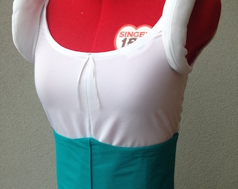 May include: A white dress with puffed sleeves and a turquoise sash. The dress has a light blue skirt and a white bodice.