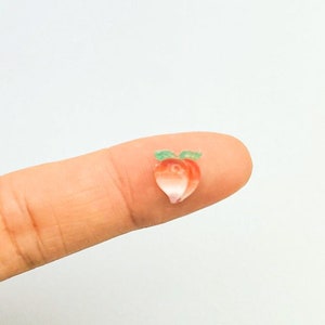 Peach Nail Charm (size: 0.33x0.28 inches)
