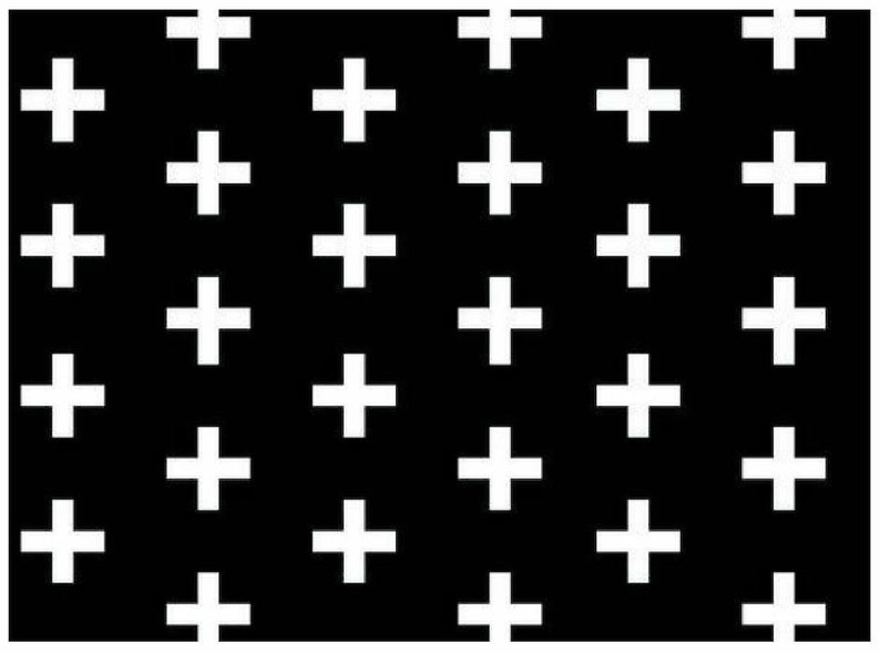 May include: A black and white pattern with white plus signs on a black background.