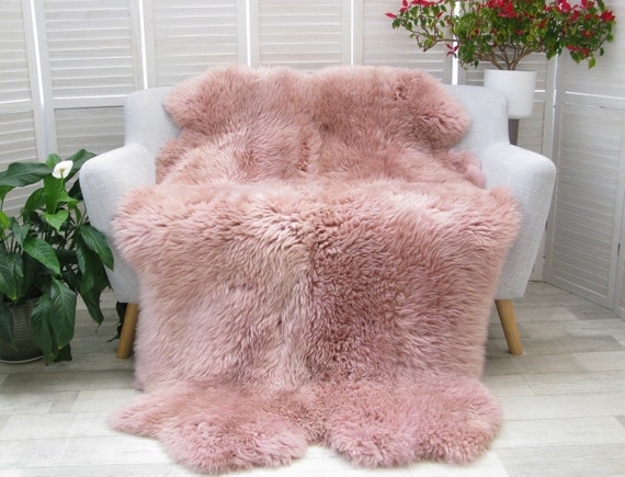 Pink sheepskin throw sale