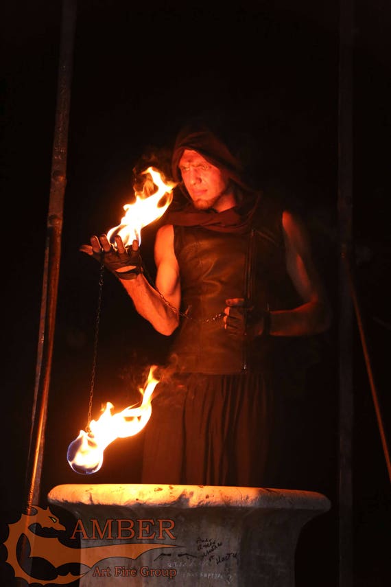 Fire ball poi Monkey's fist FIRE POI Flow art street performance. Fire ball poi Monkey's fist FIRE POI Flow art street performance.