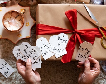 Modern Christmas gift tags made from handmade paper with velvet ribbon