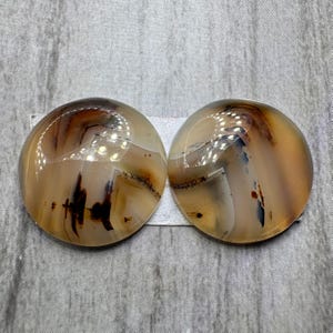 Montana agatpar cabochon. Baserad i USA. Daglig frakt. Naturstenar. Unik. Cirkelform.