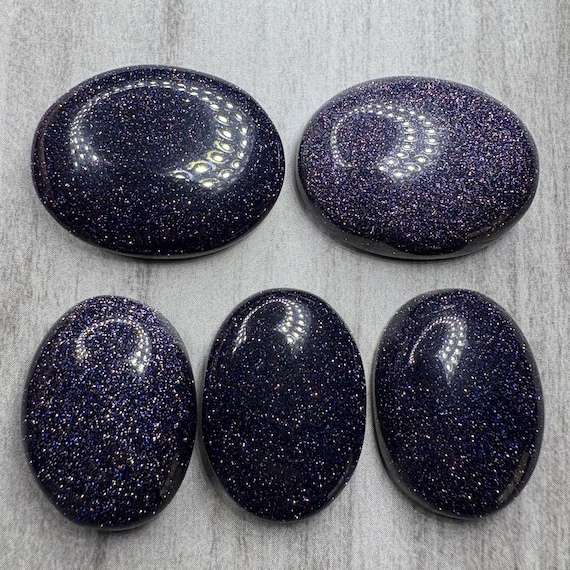 Oval blue gold stone. US seller. Beautiful sparkly polished cabochons. Daily shipping. High amount of glimmer in most of these! High domed.