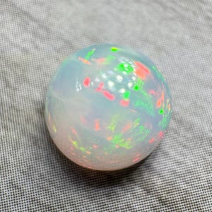 Opal cabochon. US seller. Great fire multi colors. Daily shipping. Genuine and natural stone. Ethiopian opal. 8 mm round shape domed.