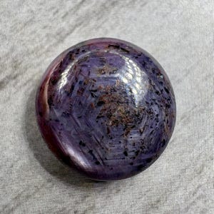 Star sapphire. US seller. Purple star sapphire cabochon. Daily shipping. Beautiful pattern and soft flash.  Genuine unheated. Flat.