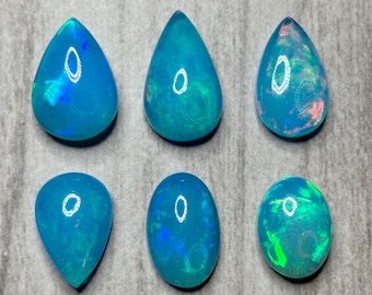 Ethiopian opal cabochon. See notes.  US seller. Daily shipping. Paraiba colored opals.