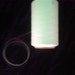 1 spool 400 g phosphorescent yarn Nm 30 yellow 30.000 m/kg on a cone glows in the dark