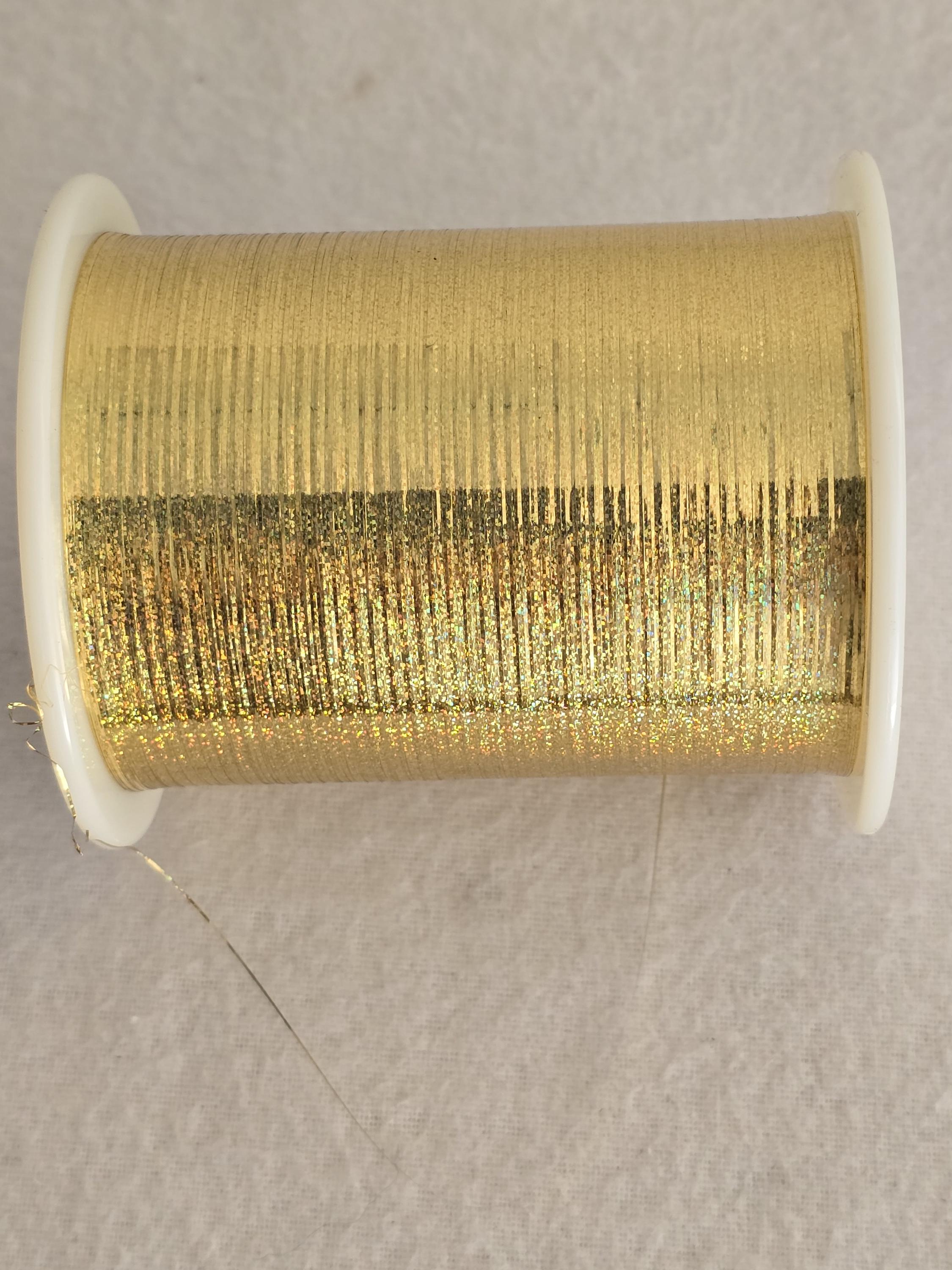 M-Type 1/69 holographisch - gold unsupported Nm 70  lurex yarn metalised flat yarn on flanged bobbine