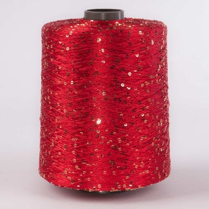 1 spool 1,3 kgs sequin yarn  Nm 5,2 red 5.200 m/kg on cone about 5.686 yards