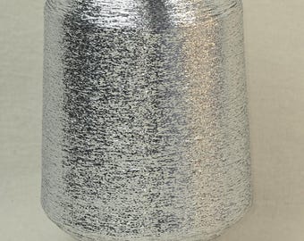 1 spool 500 g metallic yarn  Nm 83 silver 83.000 m/kg lurexyarn on a  cone