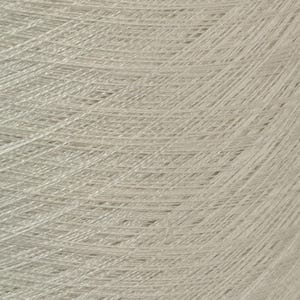 May include: A close-up of a spool of light beige yarn.