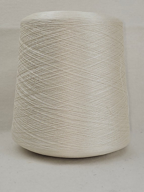 100 %  Seide Schappe GP 198,00 Euro/kg natur AAA Qualität Nm 60/2  30.000 m/kg auf einer Kone Zwirn