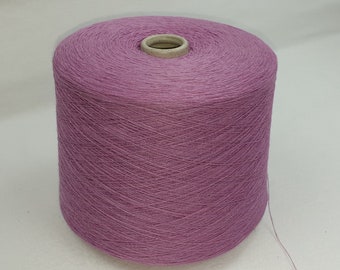 1,1 kgs yarn bobbin  color fuchsia 40 viscose/30 polyamide/25 wool/5% cashmere on a cone