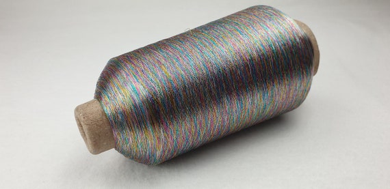 250 g Stickgarn GP 28,00 Euro//kg schwarz//gold Nm 44 Rundgarn Lurexgarn weben