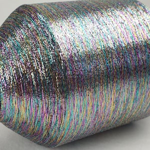1 spool 500 g metallic yarn  Nm 83 multicolor 83.000 m/kg on a bobbine lurexyarn