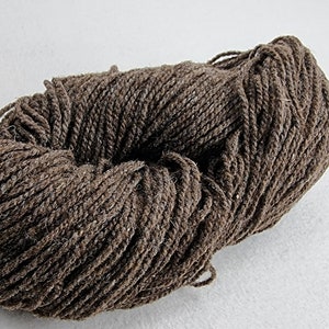 May include: A skein of brown yarn, perfect for knitting or crocheting.