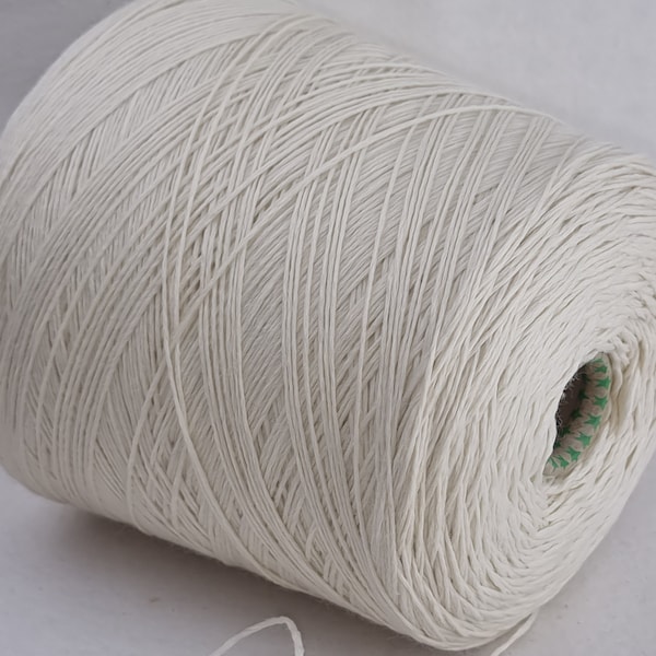 1 bobbin multi-threaded natural organic merino wool color natural on the cone mulesing free.