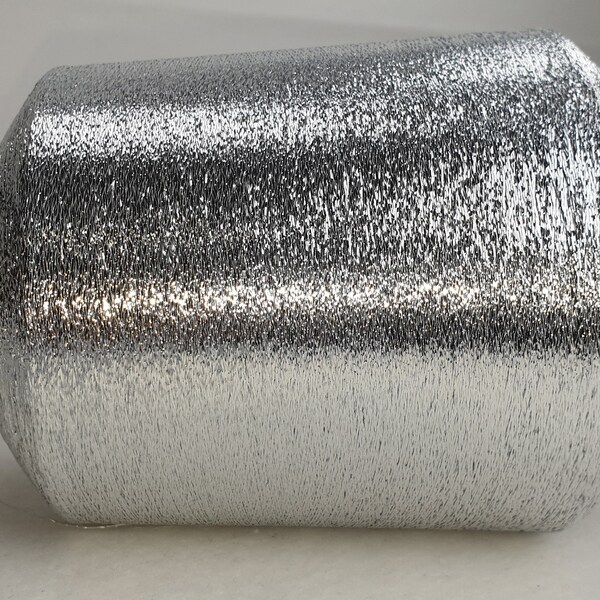 1 bobbine 500 g   fil de métalloplastique MX 1/69" argent renforcé 83.000 m/kg fil de lurex