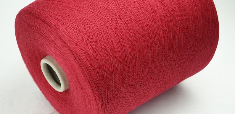 1 kg yarn bobbin 80/% wool20 polyamide  Chocolate red on a cone