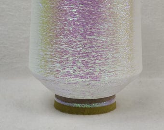 1 spool 500 g metallic yarn  Nm 83 irise 83.000 m/kg on a spool