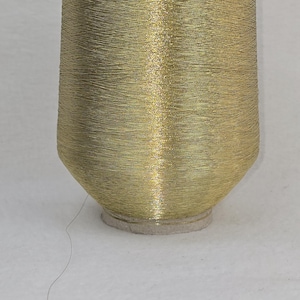 500 g hilo de bordar PhiloTeXX® o hilo redondo 46,00 euros/kg con brillo metálico color dorado Nm 38 tejido ÖkoTex Standard 100