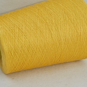 460 g 100 % silk Schappe GP 129,00 Euro/kg yellow AAA quality Nm 120/4 30.000 m on cone