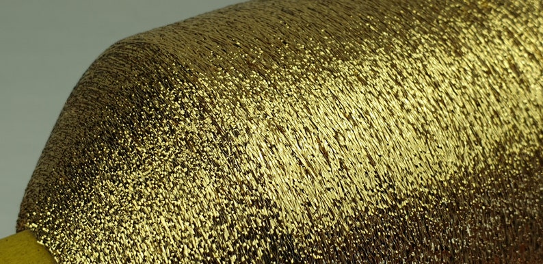 1 spool 500 g metallic yarn Nm 83 gold 83.000 m/kg lurexyarn image 2