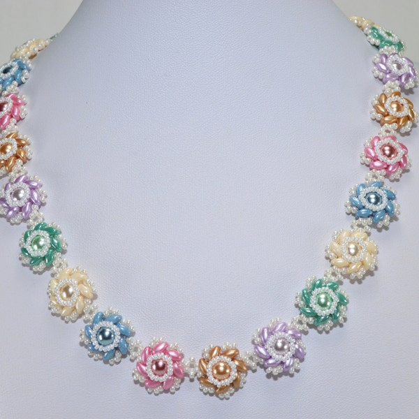 Daisy flowers of angled superduos surrounding  pearls make a cute necklace called Daisy Twirls - A PDF Beading Pattern