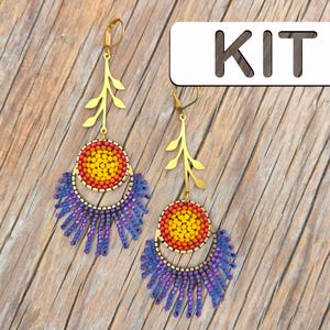 May include: A pair of handmade earrings with a gold-tone leaf design and lever-back closures. The earrings feature a circular center with yellow, orange, and red beads, and a half-circle of purple beads. The word "KIT" is in the image.