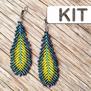 May include: A kit to make a pair of beaded earrings. The earrings are long and teardrop shaped. They are made with black, yellow, and turquoise beads.