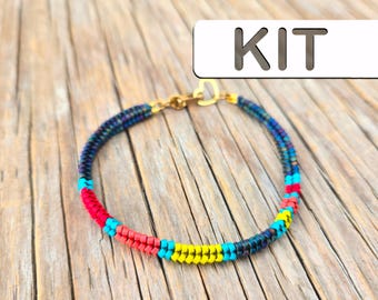 May include: A colorful beaded bracelet kit with red, yellow, blue, and turquoise beads. The kit includes all the materials needed to make a bracelet.