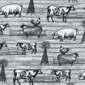 May include: Black and white farm-themed fabric featuring illustrations of cows, pigs, sheep, chickens, windmills, and fences. The design is repeated across a light gray, wood-grain textured background.