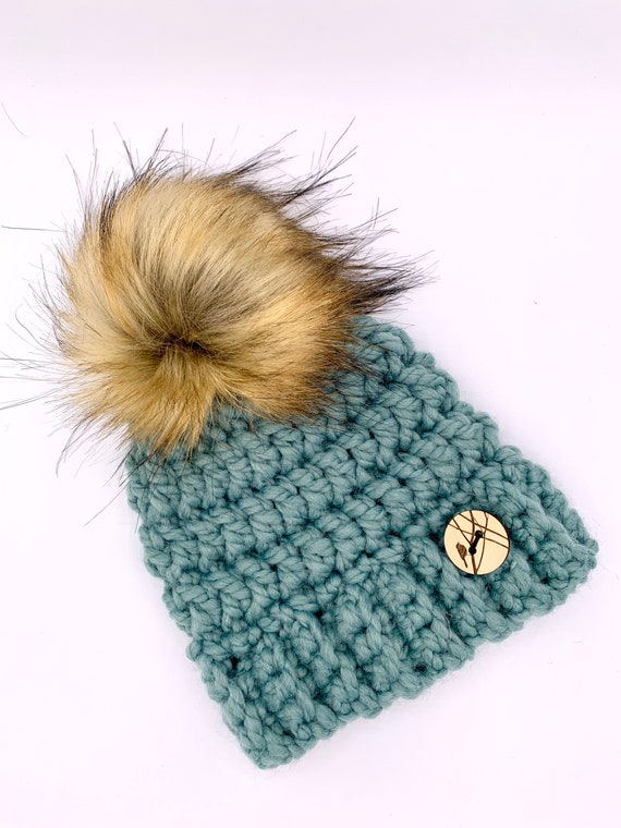 baby toques with pom pom