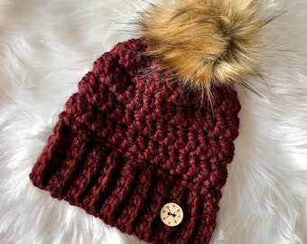 Women's Adult Burgundy Coloured Crochet Toque with Faux Fur Pom Pom