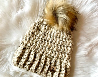 Women’s Adult Oatmeal Coloured Crochet Toque With Faux Fur Pom Pom